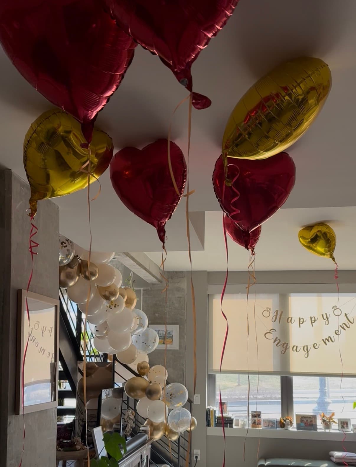 Red and gold heart balloons with Happy Engagement banner